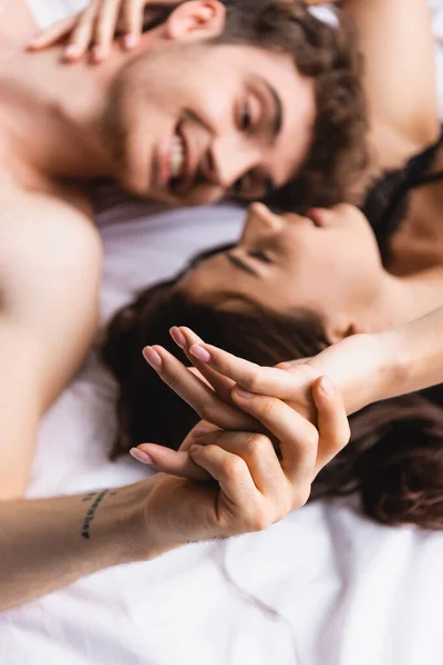 Selective Focus Shirtless Man Woman Underwear Holding Hands Lying Bed — Stock Photo, Image