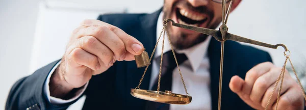 Horizontal Crop Excited Lawyer Holding Miniature Weights Golden Scales — Stock Photo, Image