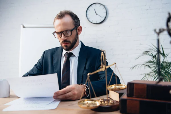 Selective Focus Bearded Lawyer Looking Documents Golden Scales Books — Stock Photo, Image