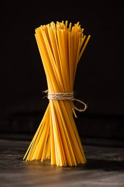 Tied Uncooked Italian Spaghetti Isolated Black — Stock Photo, Image