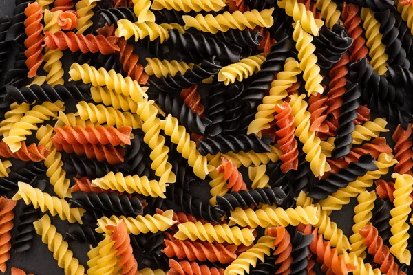 Top View Raw Colorful Fusilli Pasta — Stock Photo, Image