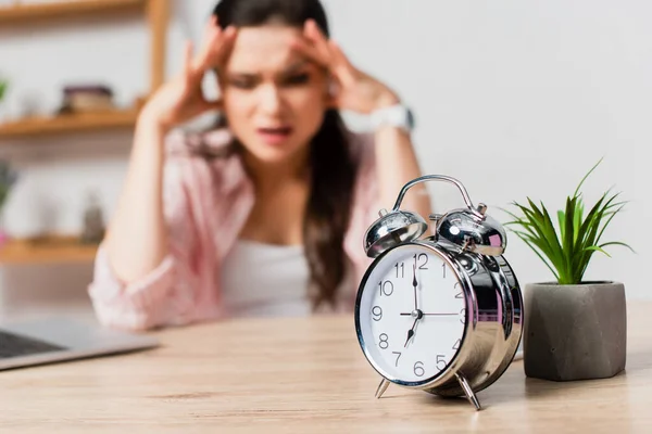 Selective Focus Vintage Alarm Clock Plant Stressed Woman Touching Head — Stock Photo, Image
