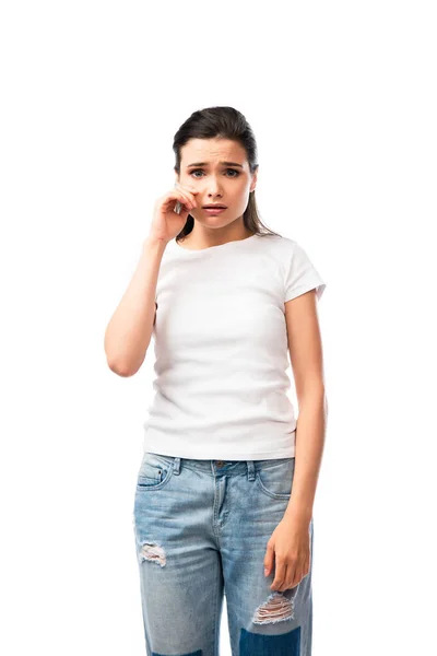 Mujer Joven Camiseta Blanca Llorando Tocando Cara Aislada Blanco —  Fotos de Stock