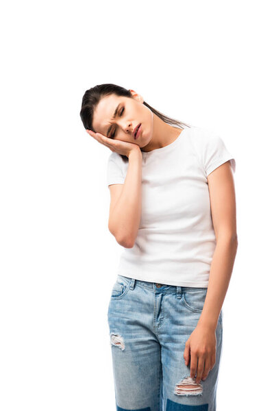 exhausted woman in white t-shirt standing isolated on white 