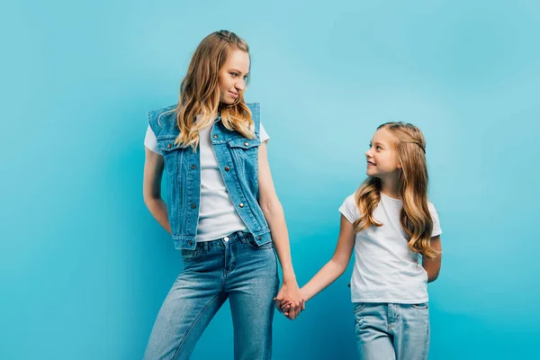Child White Shirt Holding Hands Mother Denim Clothes While Looking — Stock Photo, Image