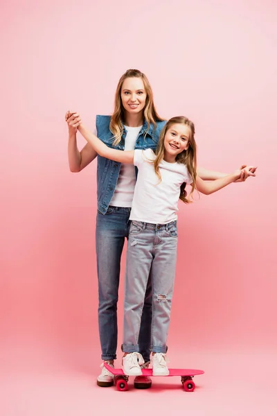 Full Length View Woman Denim Clothes Supporting Daughter Standing Penny — Stock Photo, Image