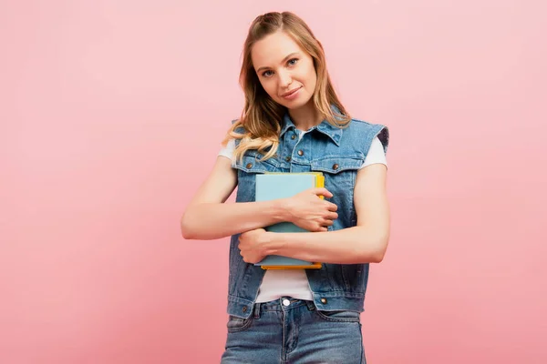 Young Woman Denim Clothes Holding Books Looking Camera Isolated Pink — Stock Photo, Image