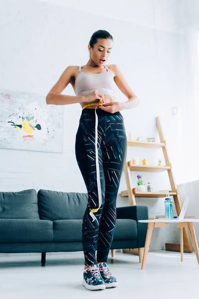 Low Angle View Shocked Sportswoman Measuring Waist Tape Home — Stock Photo, Image