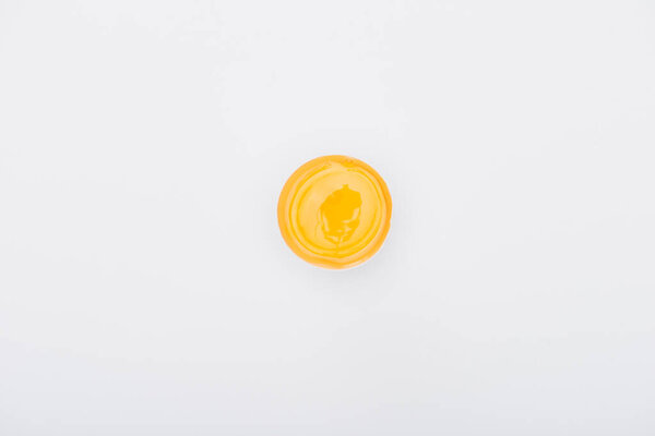 top view of fresh chicken egg with yolk isolated on white