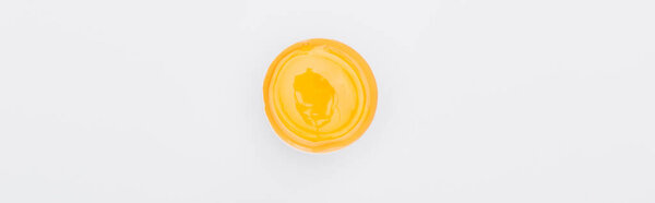 top view of fresh chicken egg with yolk isolated on white, panoramic shot