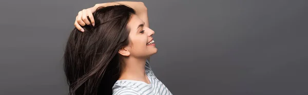 Side View Brunette Woman Closed Eyes Smiling Touching Hair Isolated — Stock Photo, Image