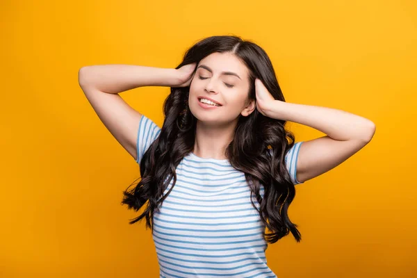 Brunette Woman Closed Eyes Toughing Curly Long Hair Smiling Isolated — Stock Photo, Image