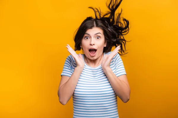 Shocked Brunette Long Haired Woman Curls Jumping Isolated Yellow — Stock Photo, Image