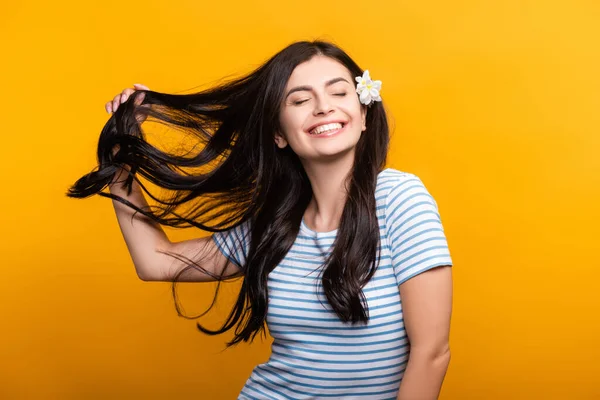 Brunette Young Woman Flowers Hair Closed Eyes Smiling Isolated Yellow — Stock Photo, Image