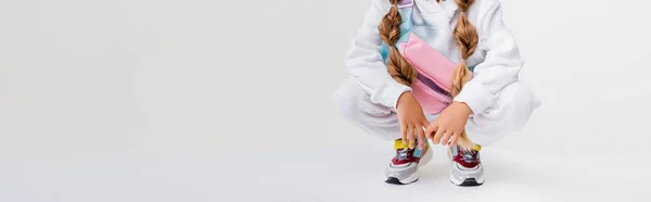 Cropped View Blonde Girl Sportswear Sitting Cube Isolated White Panoramic — Stock Photo, Image