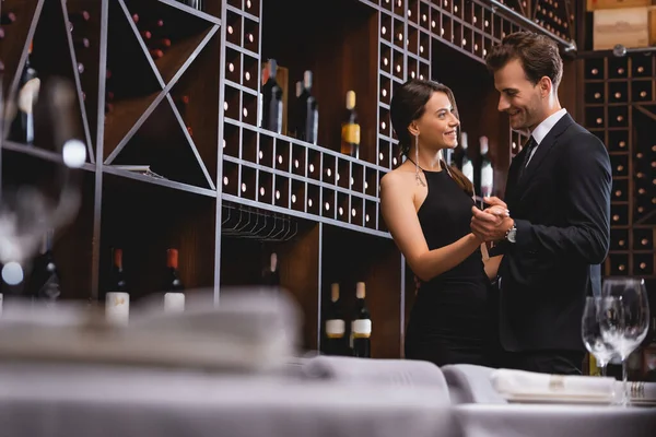 Selective Focus Elegant Couple Dancing Racks Wine Bottles Restaurant — Stock Photo, Image