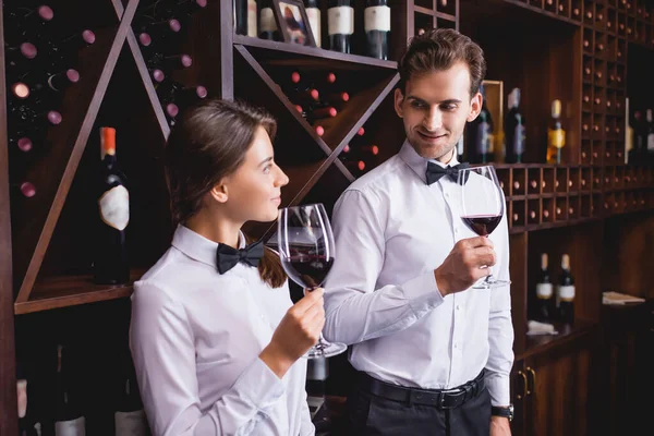 Selective Focus Sommelier Holding Glass Wine Looking Colleague Restaurant — Stock Photo, Image