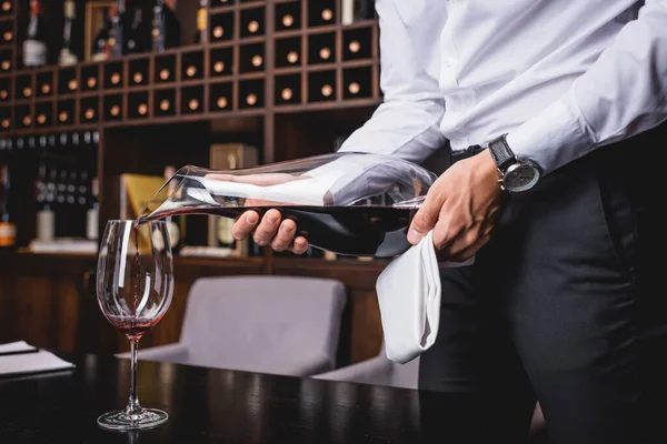 Cropped View Sommelier Pouring Red Wine Decanter Glass — Stock Photo, Image