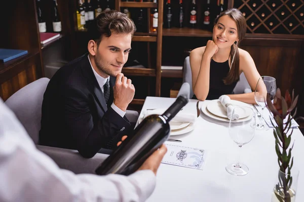 Selective Focus Young Couple Looking Sommelier Bottle Wine Restaurant — Stock Photo, Image