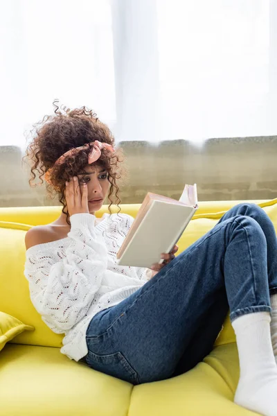 Sad Young Woman Reading Book Living Room — Stock Photo, Image