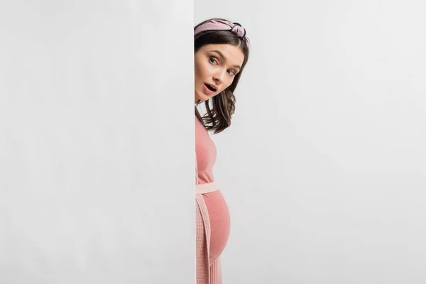 Shocked Pregnant Woman Hiding Wall Isolated White — Stock Photo, Image