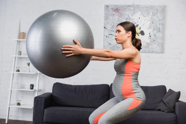 Brunette Pregnant Woman Breathing While Doing Squat Fitness Ball Living — Stock Photo, Image