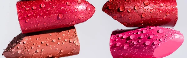 Close View Wet Lipsticks Isolated White Panoramic Shot — Stock Photo, Image