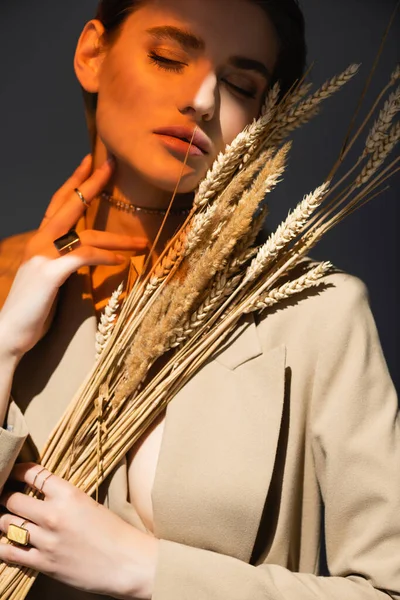 Lighting Young Woman Beige Blazer Holding Barley Spikelets Dark Grey — Stock Photo, Image