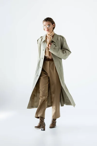 Full Length Trendy Woman Glasses Trench Coat Scarf Walking White — Stock Photo, Image