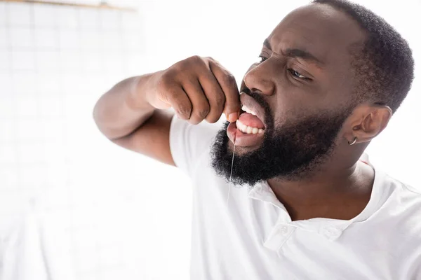 Afro American Man Using Dental Floss Bathroom — Stock Photo, Image