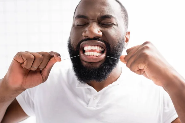 Portrait Afro American Man Closed Eyes Using Dental Floss — Stock Photo, Image