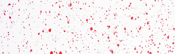 top view of abstract red paint stains on white background, panoramic shot