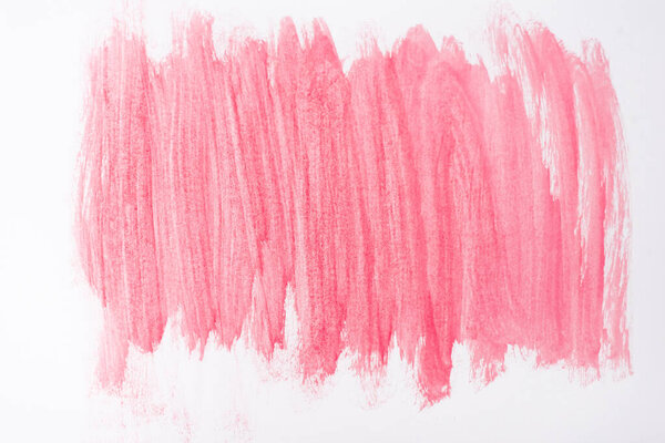 top view of abstract pink paint brushstrokes on white background