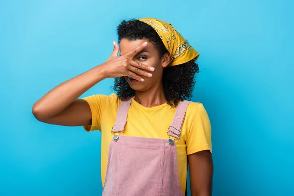 African American Woman Covering Eye Hand Blue — Stock Photo, Image
