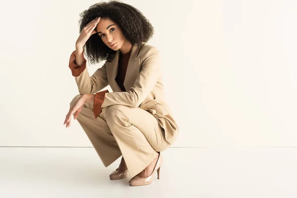 Young Curly African American Woman Stylish Suit Sitting White — Stock Photo, Image