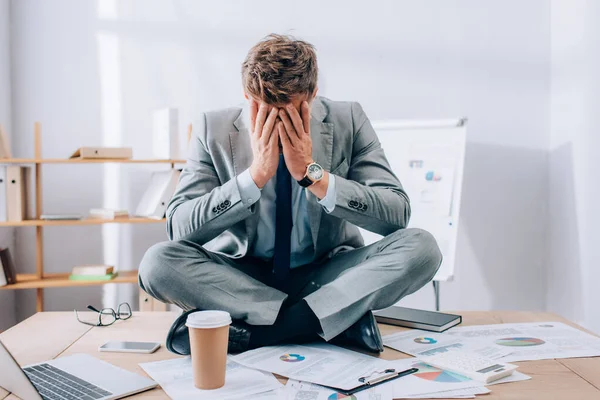 Businessman Covering Face Hands While Sitting Coffee Devices Papers Table — Stock Photo, Image