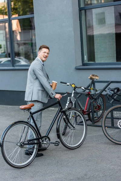 Cheerful Businessman Takeaway Coffee Standing Bicycle Parking Outdoors — Stock Photo, Image