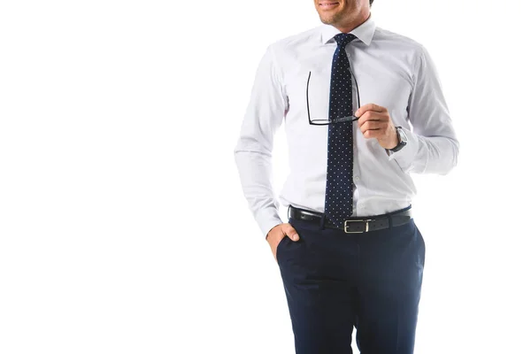 Cropped image of smiling businessman holding eyeglasses isolated on white background — Stock Photo