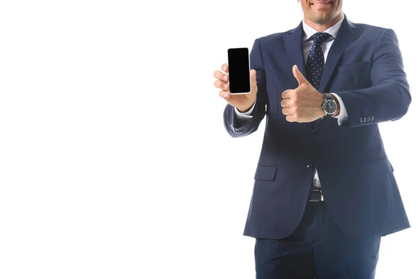 Cropped image of businessman holding smartphone with blank screen and doing thumb up gesture isolated on white background — Stock Photo