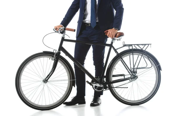 Cropped image of businessman standing with bicycle isolated on white background — Stock Photo