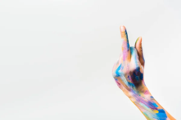 Imagem cortada da menina com arte corporal brilhante colorido mostrando dedo médio isolado no branco — Fotografia de Stock