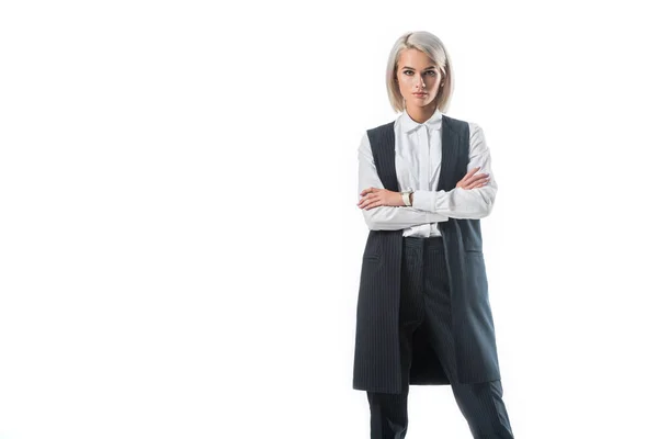 Portrait of young stylish businesswoman in formal wear with arms crossed isolated on white — Stock Photo