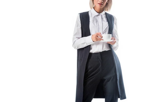 Partial view of businesswoman with cup of coffee isolated on white — Stock Photo