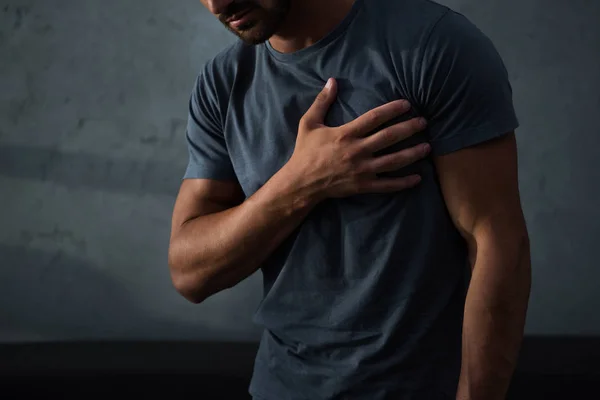 Cropped view of man having chest pain and heart attack — Stock Photo