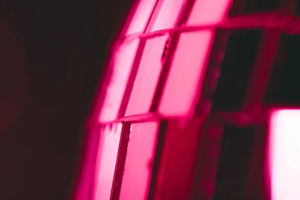 Close-up view of shiny pink disco ball on black background — Stock Photo