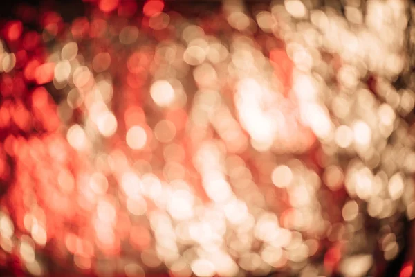 Beautiful shiny golden bokeh lights, defocused abstract background — Stock Photo