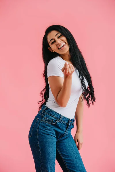 Cheerful african american woman pointing at camera isolated on pink — Stock Photo