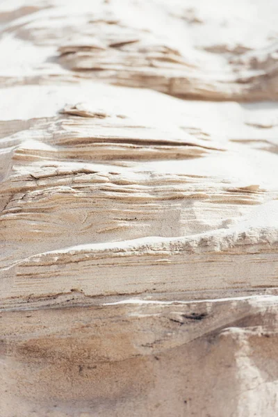 Gros plan de sable brun sec dans le désert — Photo de stock