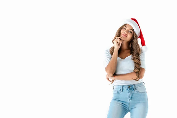 Attractive stylish girl posing in santa hat, isolated on white — Stock Photo