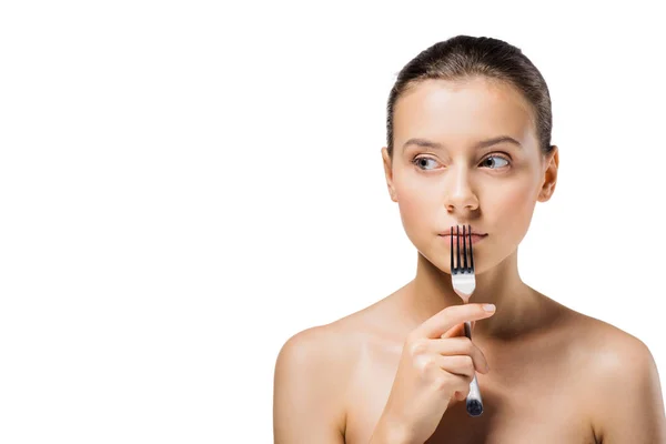 Young beautiful woman with silver fork near mouth — Stock Photo